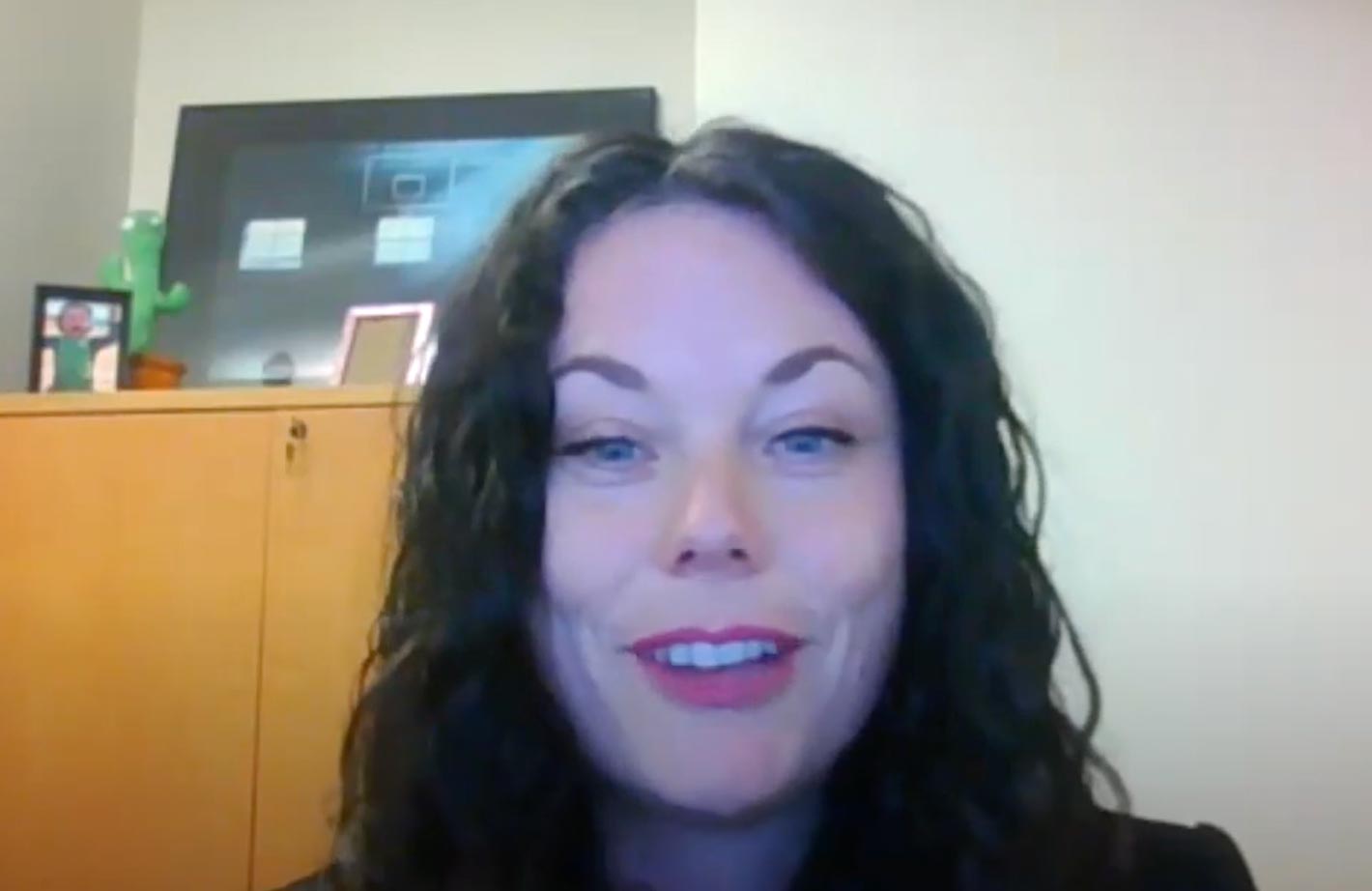 Laura Beth talks to a webcam. She has long